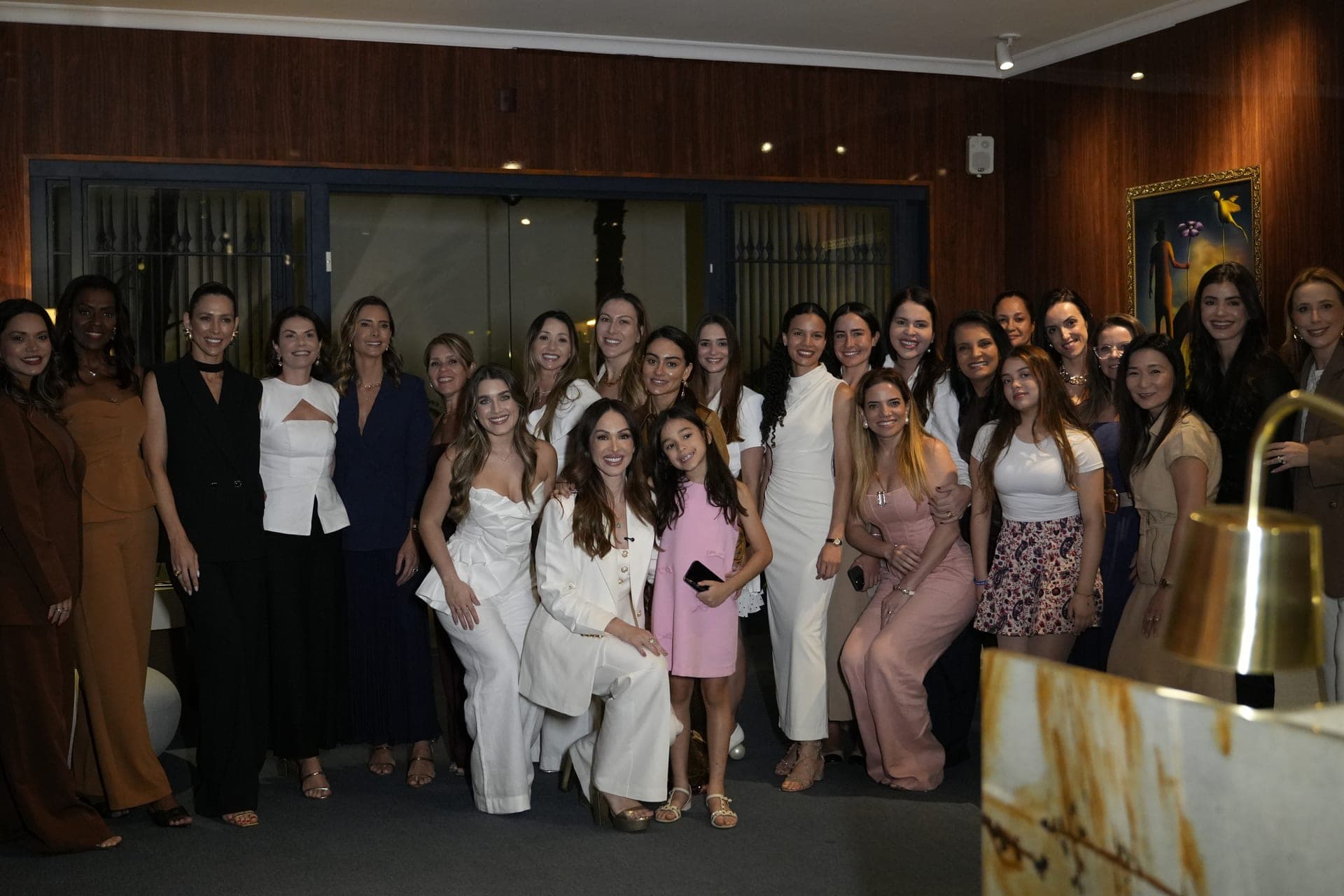 Evento da Comunidade Excelência — grupo de mulheres reunidas